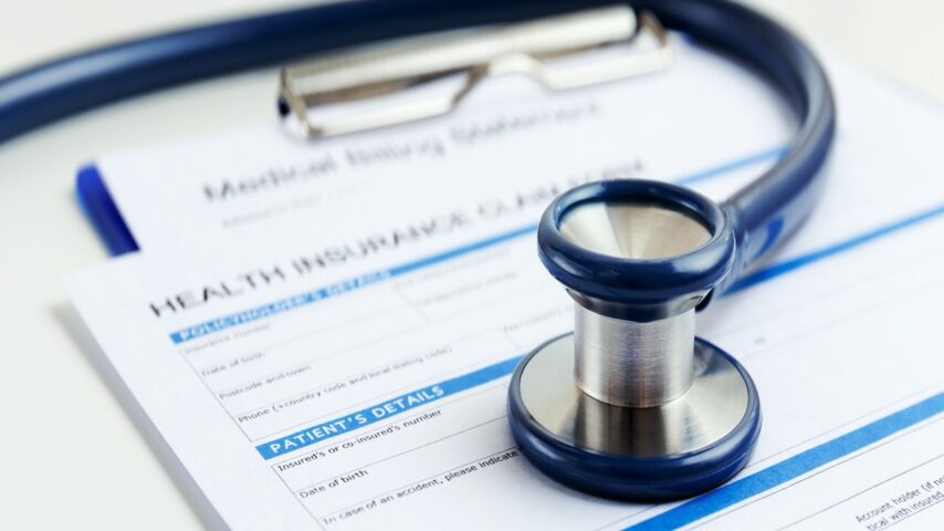 Stethoscope on Bridgespan health insurance form